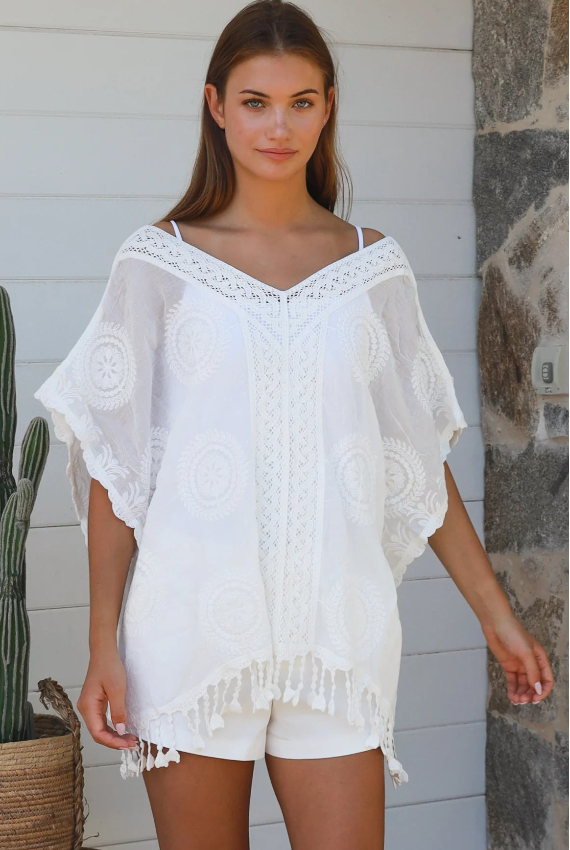 Essie embroidered white cotton kimono top with crochet medallion detailing scalloped sleeves and tassel hem