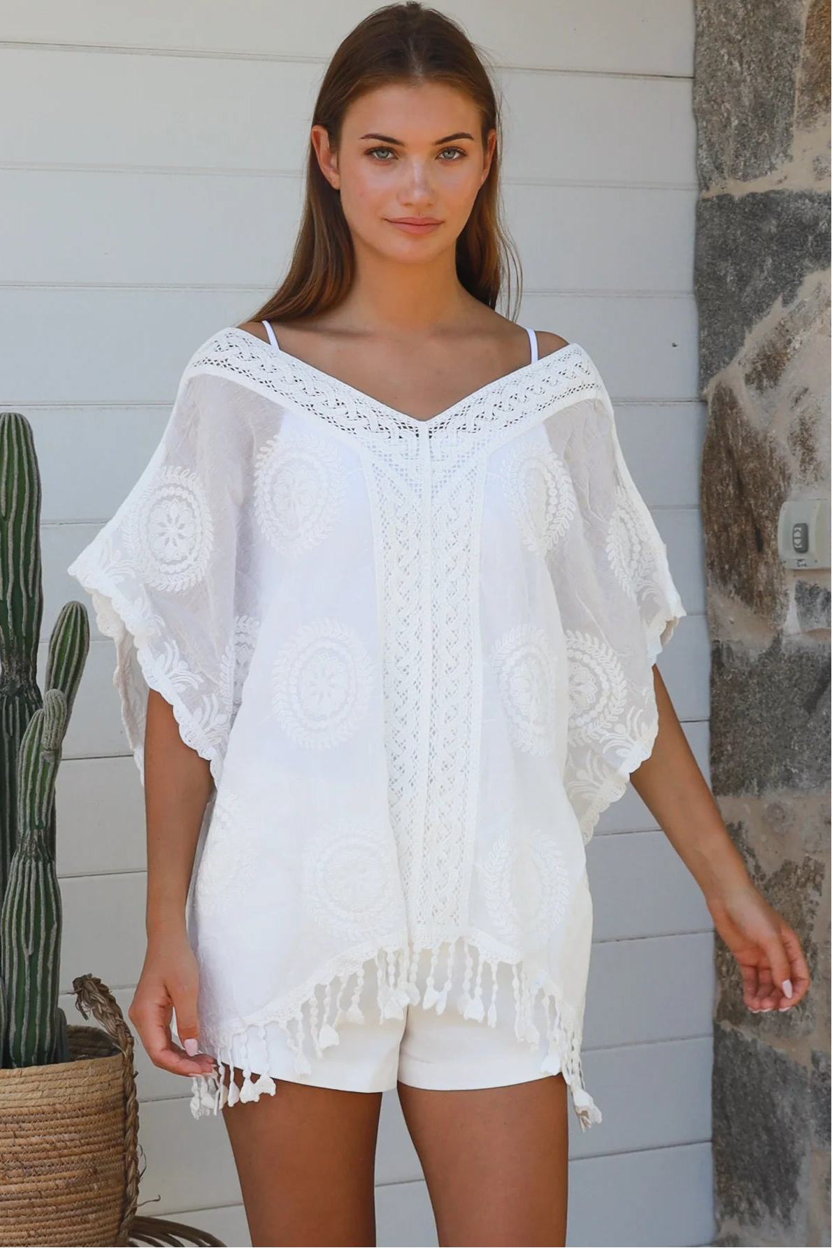 Essie embroidered white cotton kimono top with crochet medallion detailing scalloped sleeves and tassel hem