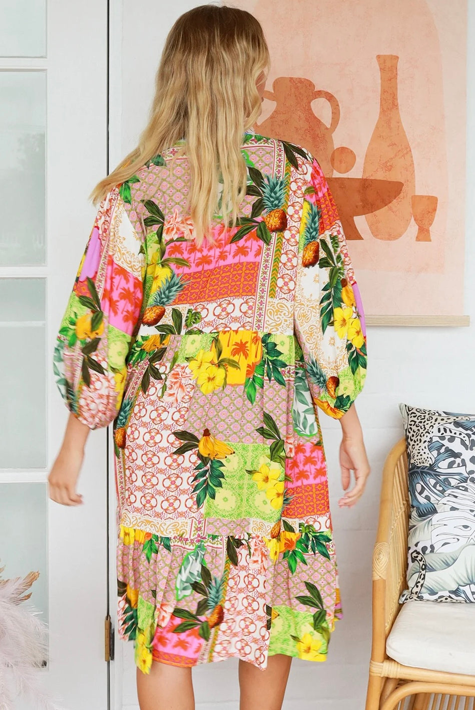 “Woman in a tropical bamboo patchwork boho midi dress with mandarin collar and belt – sustainable bohemian clothing Australia”