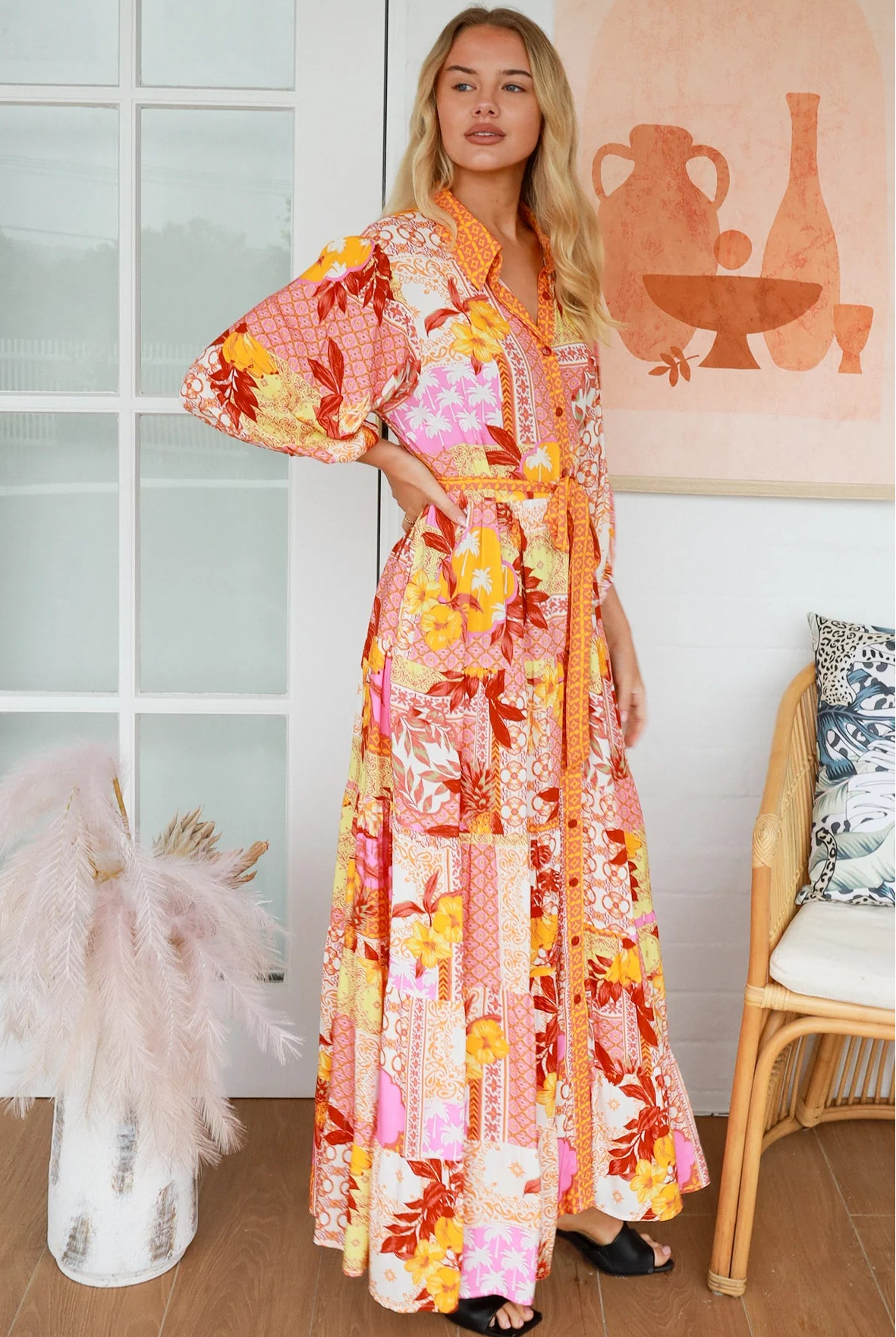 Jacqueline Floral Maxi Dress by Salty Palm in coral pink patchwork floral print with sash, pockets and button-through front