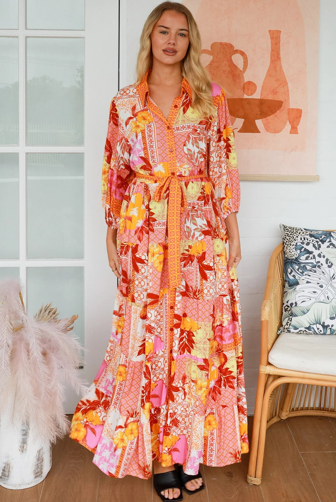 Jacqueline Floral Maxi Dress by Salty Palm in coral pink patchwork floral print with sash, pockets and button-through front
