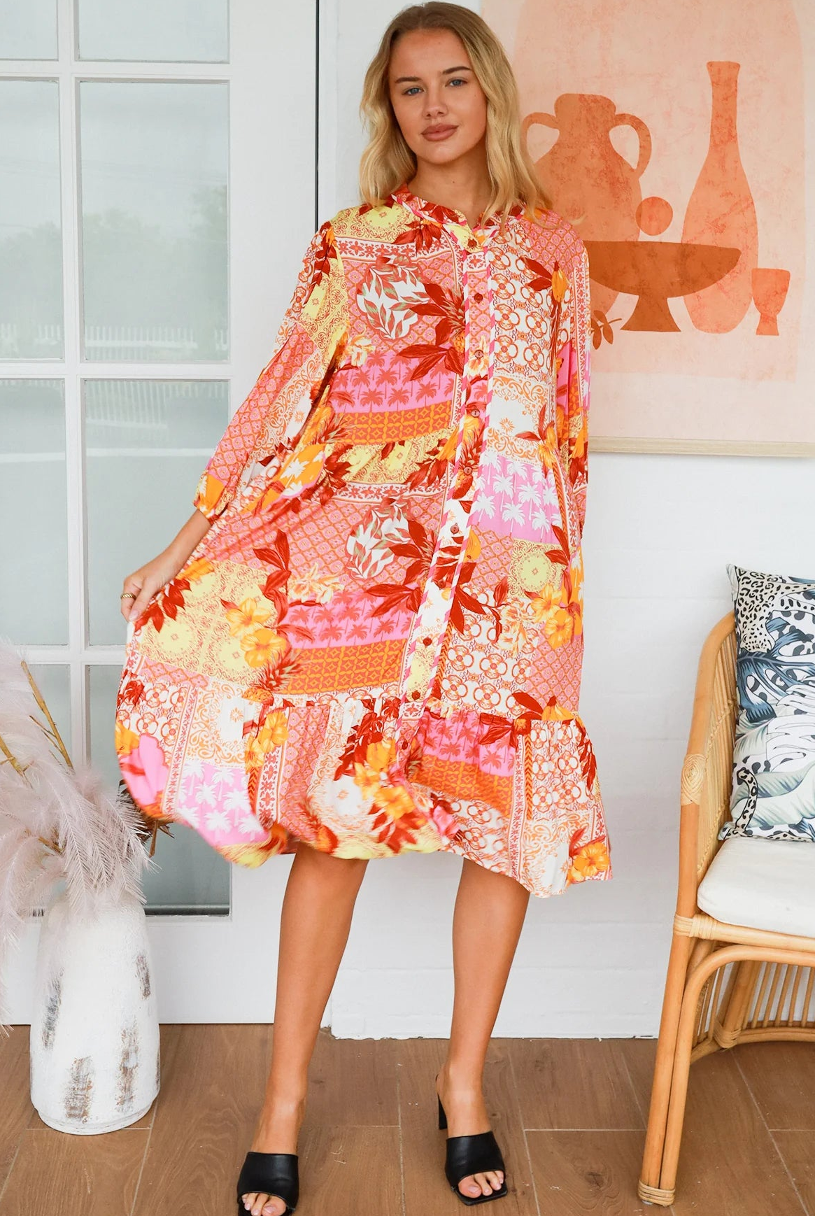Jacqueline Floral Midi Dress by Salty Palm in coral pink patchwork floral print with split neckline and self-tie sash