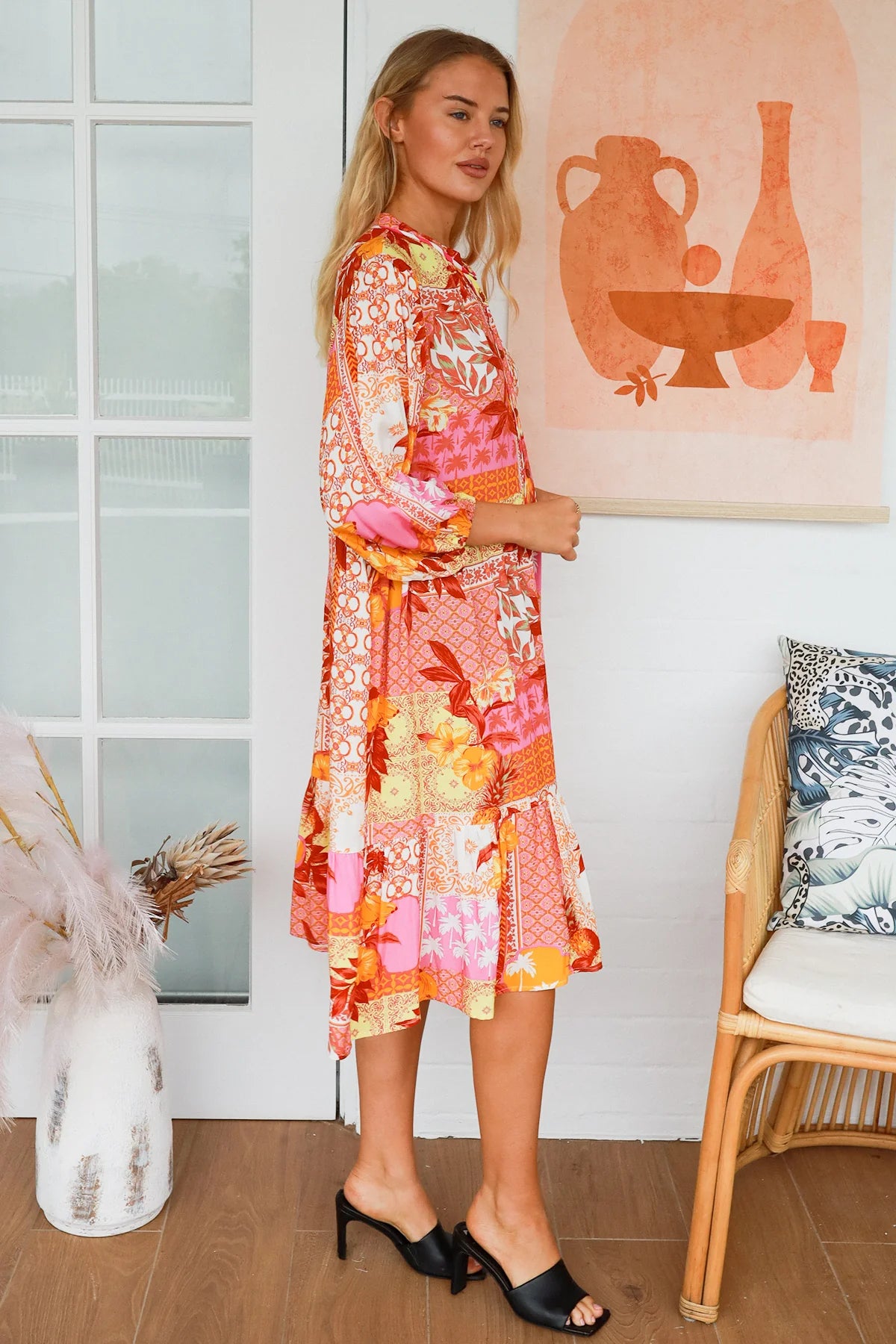 Jacqueline Floral Midi Dress by Salty Palm in coral pink patchwork floral print with split neckline and self-tie sash