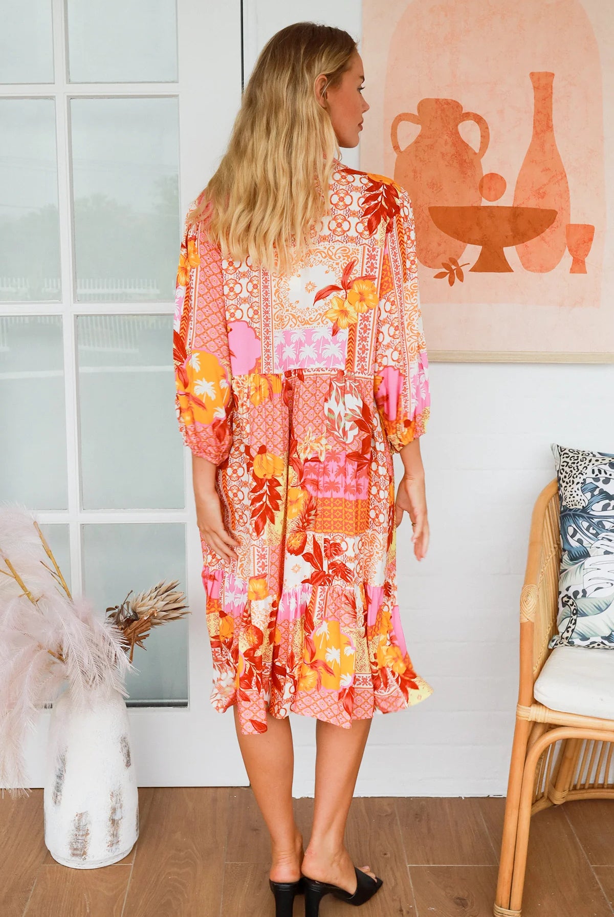 Jacqueline Floral Midi Dress by Salty Palm in coral pink patchwork floral print with split neckline and self-tie sash