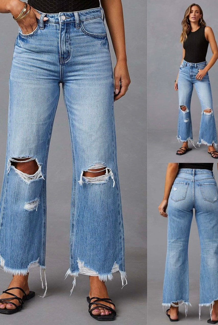Woman wearing high-waisted light blue wide-leg jeans with raw hem and black tank - boho denim jeans Australia.