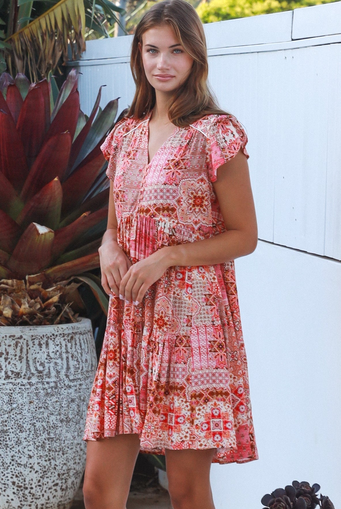 Camilla boho mini dress in rayon with button front empire waist flutter sleeves and tiered skirt Australian fashion