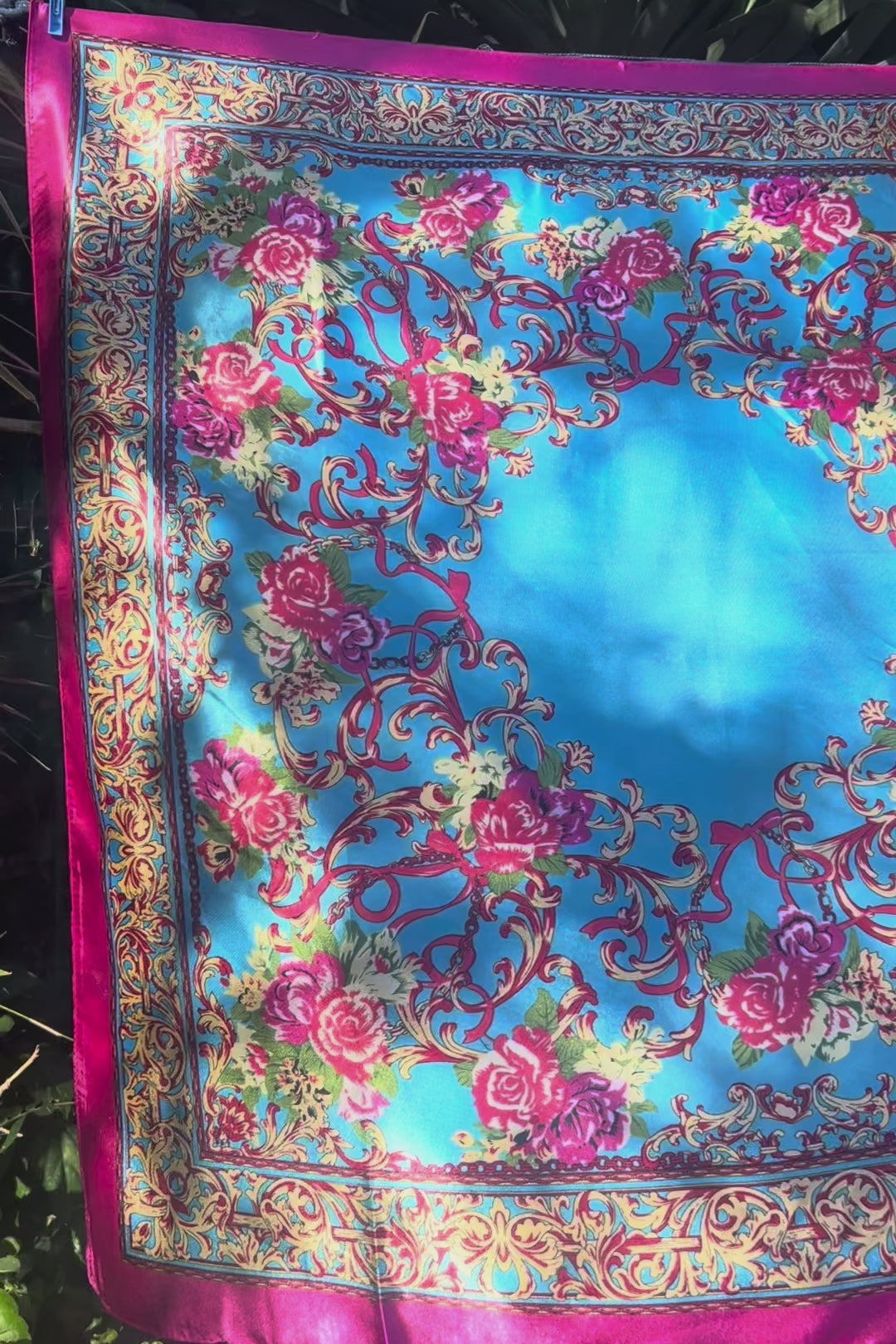 Cerulean scarf with gold scrolls, pink and crimson rose, and a fuchsia border. 90x90cm. Silk satin feel.