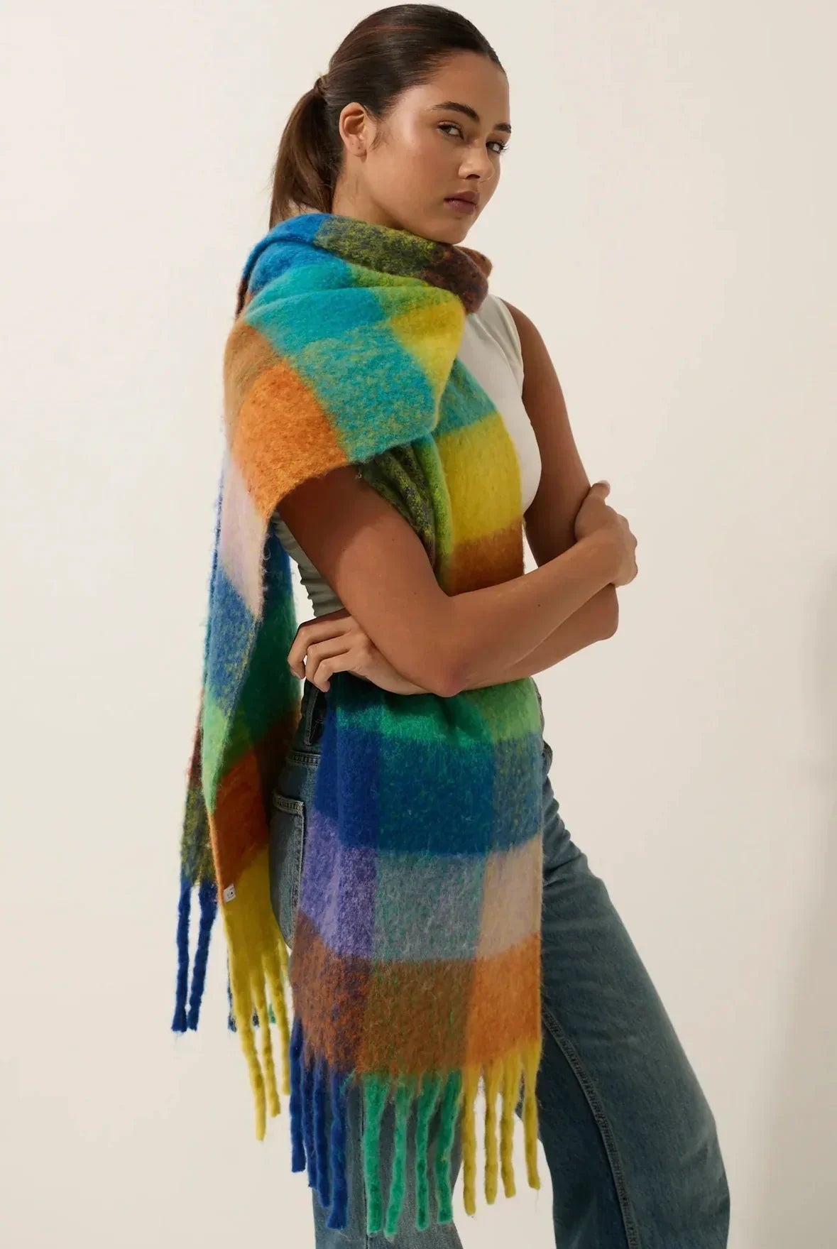 Model wearing winter boho check scarf from Bohemian Love Runway