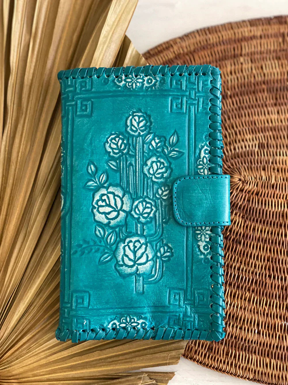 Turquoise leather boho wallet with hand-tooled floral design - Bohemian Love Runway.