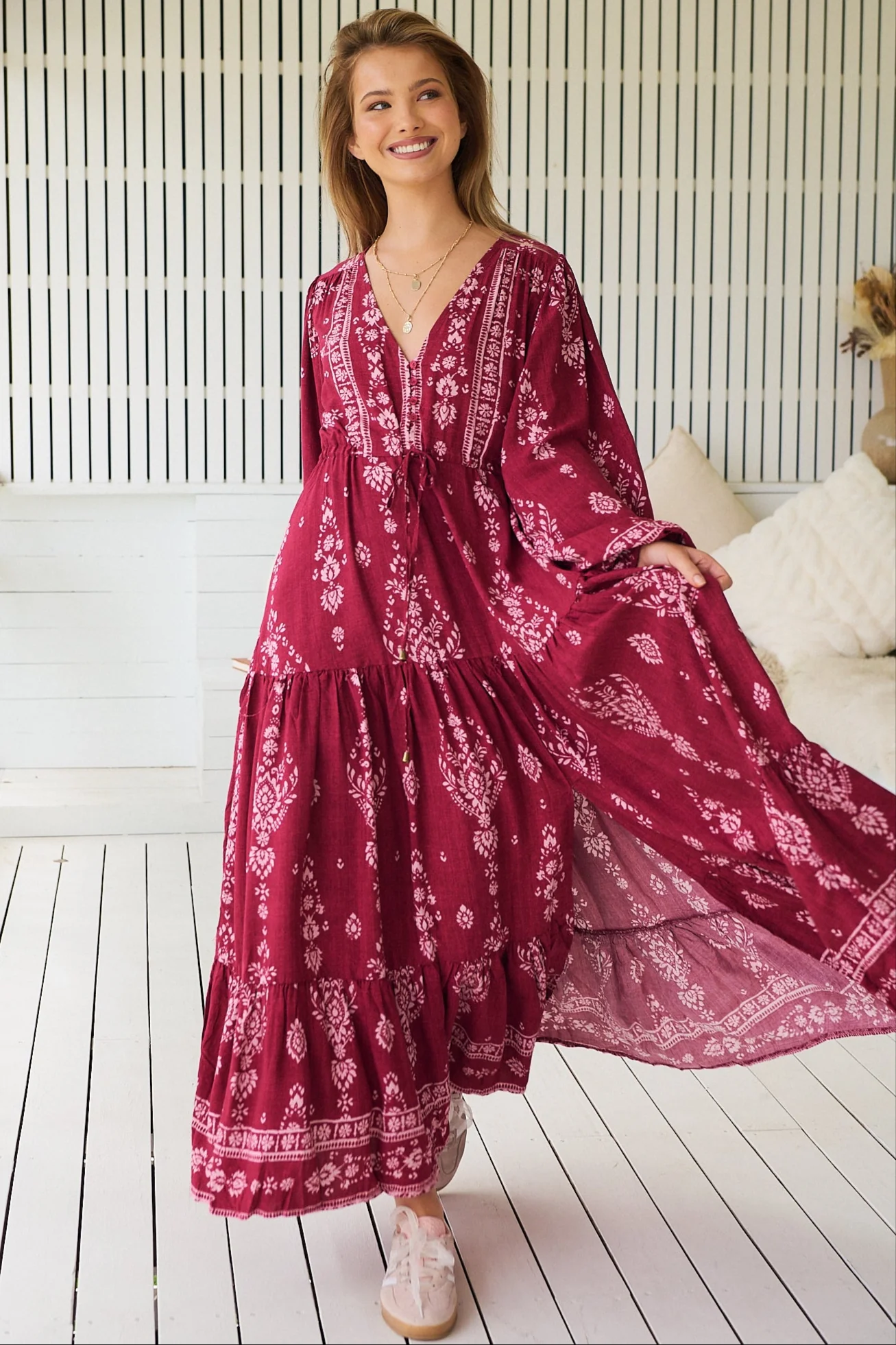 boho dress with long sleeves, tiered skirt, and drawstring waist - flowy, feminine style with vintage-inspired detail.