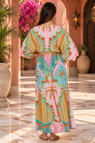 Amara pink turquoise floral paisley maxi dress by Dream Catcher with V-neck, kimono sleeves and border print
