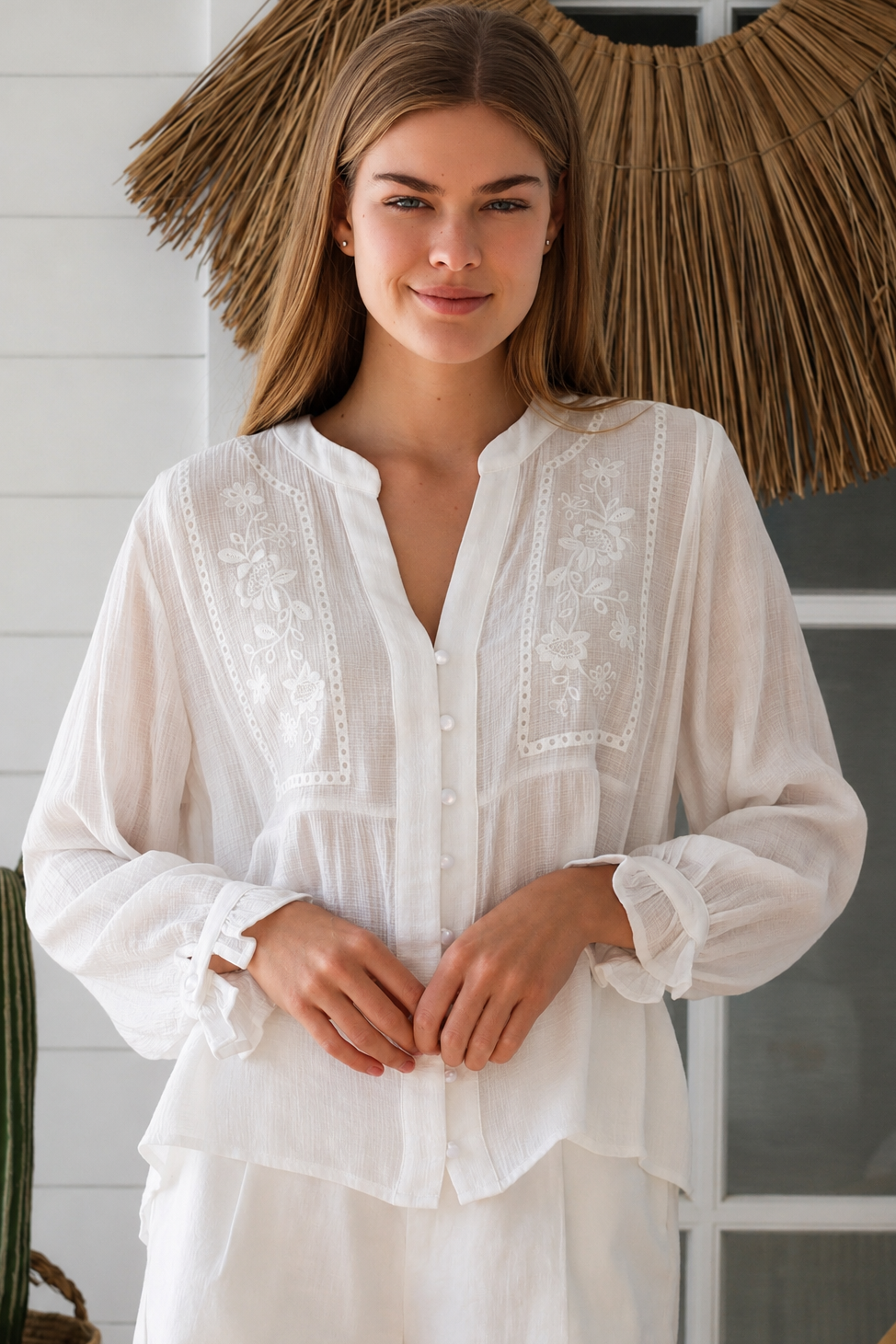 Paige white embroidered blouse by Salty Palm with floral panels, split neckline and long relaxed sleeves