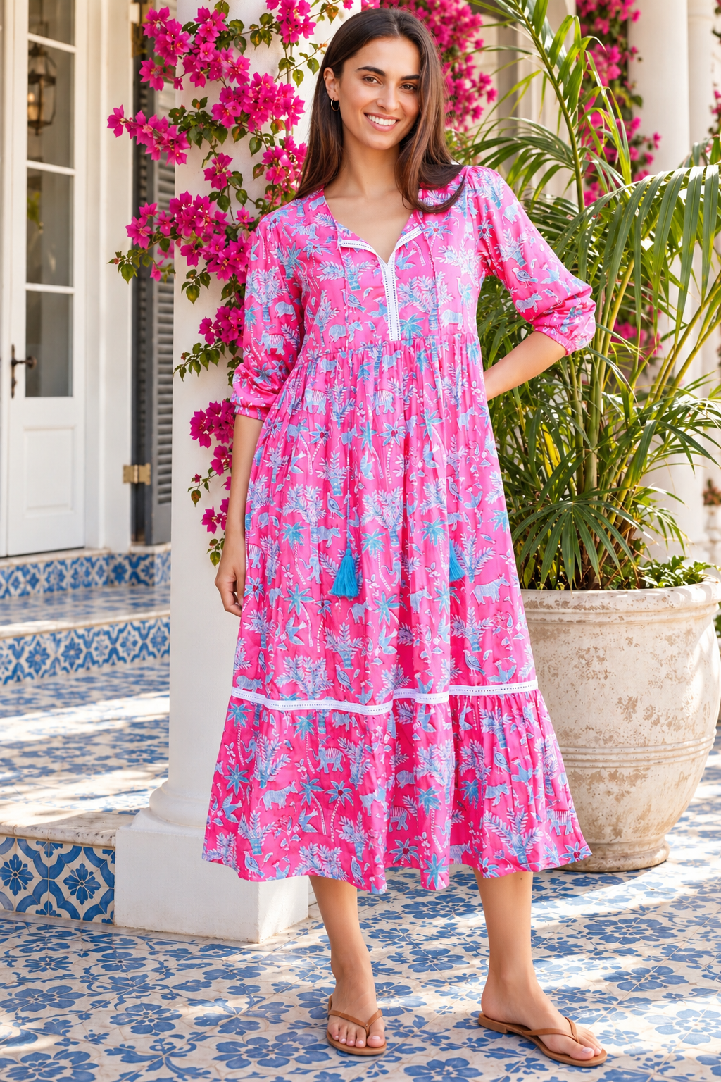 Mahale Sanctuary Midi Dress Pluto Pink in 100% cotton with turquoise wildlife print, white lace trim and frill hem