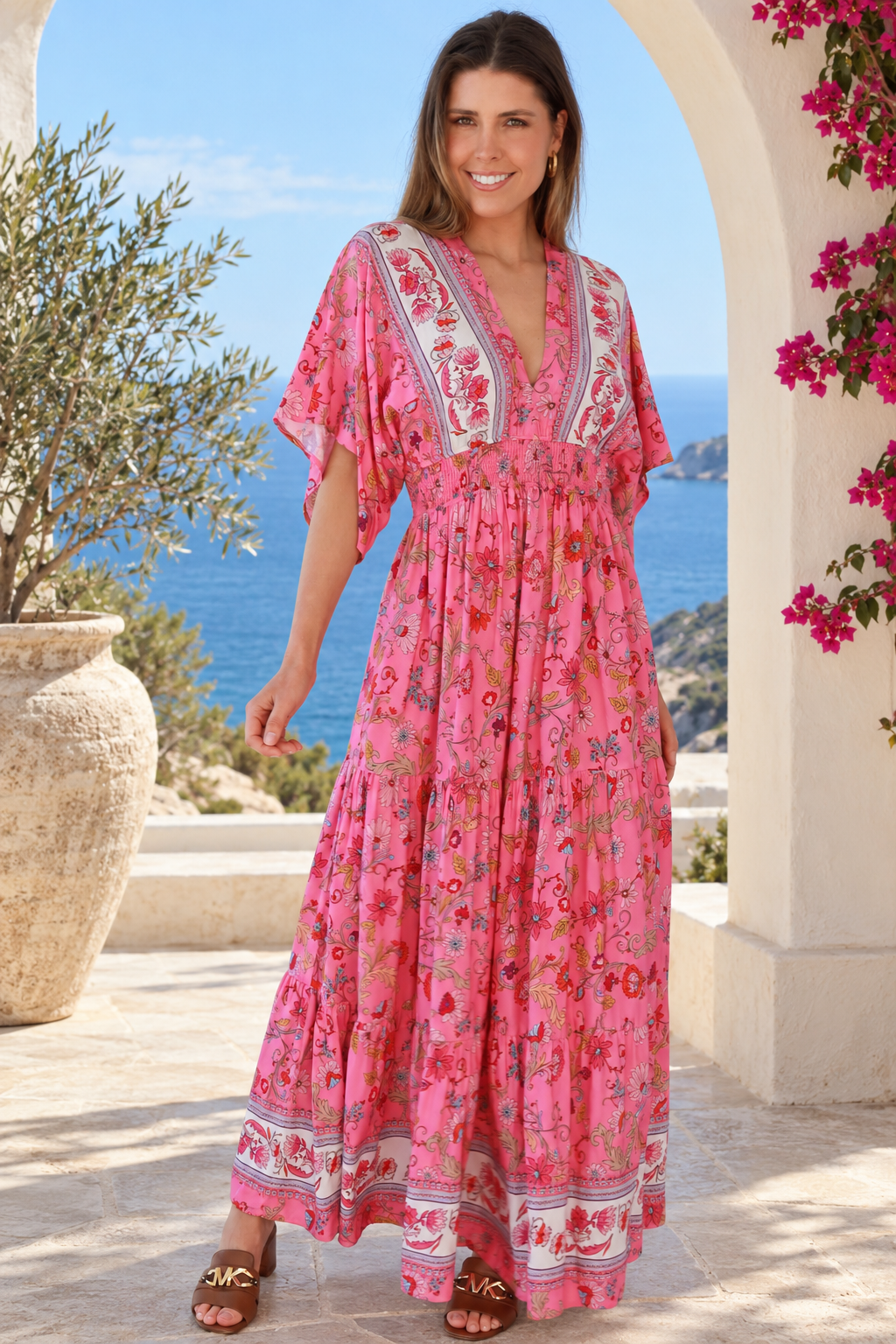 Eliana Bloom pink floral rayon boho maxi dress with V-neckline, smocked waist and tiered skirt.