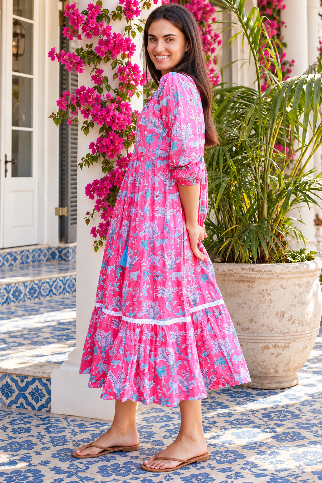Mahale Sanctuary Midi Dress Pluto Pink in 100% cotton with turquoise wildlife print, white lace trim and frill hem