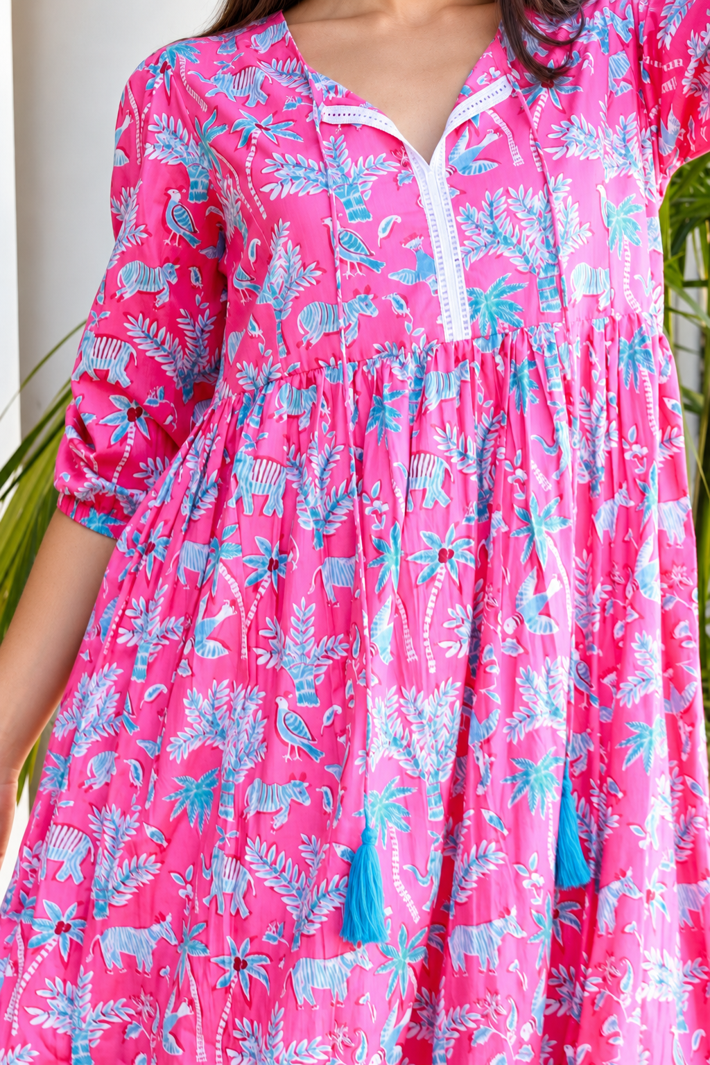 Mahale Sanctuary Midi Dress Pluto Pink in 100% cotton with turquoise wildlife print, white lace trim and frill hem
