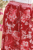Claudette floral boho maxi skirt in ruby red, blush pink and ivory with border print, elastic waist and side splits
