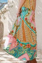 Amara floral boho maxi skirt in 100% rayon with colourful placement print, gathered frill hem and tassel tie