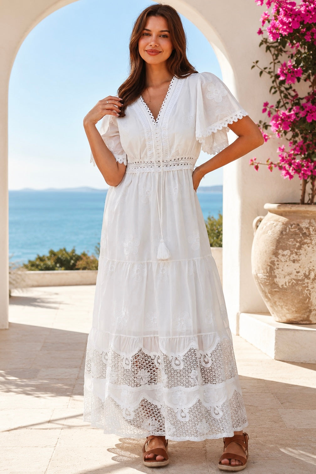 Willow white embroidered cotton maxi dress with openwork lace and tassel ties by Salty Palm at Bohemian Love Runway