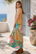 Amara floral boho maxi skirt in 100% rayon with colourful placement print, gathered frill hem and tassel tie