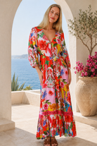 Scarlet floral long sleeve boho maxi dress with V-neck, buttons, elastic waist and lace detail at Bohemian Love Runway
