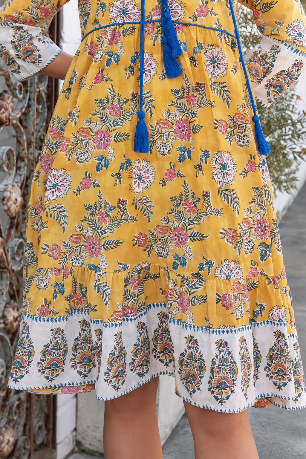 Golden Dahlia Peacock Feather cotton boho dress with cobalt tassels and ornate floral border print