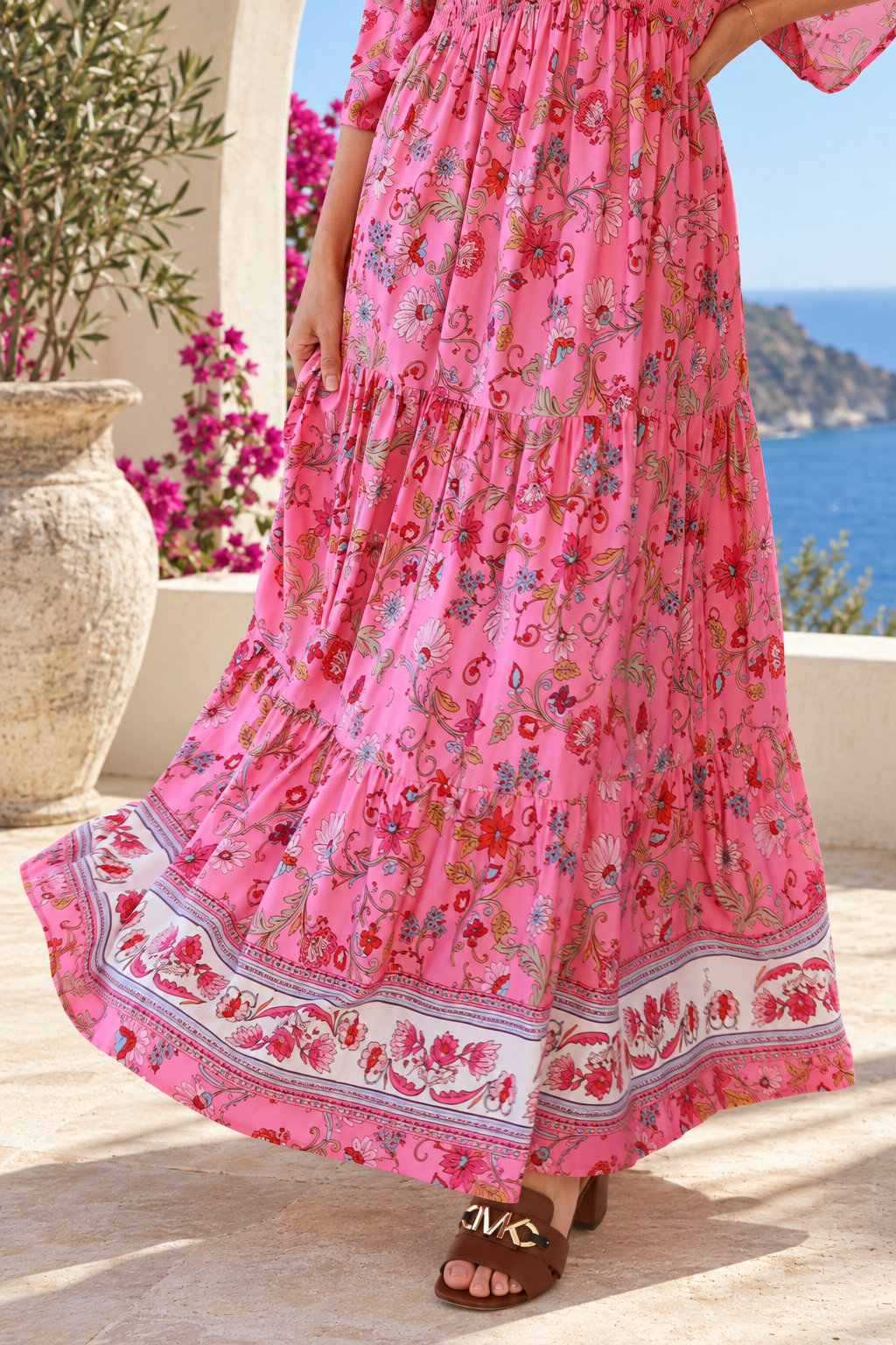 Eliana Bloom pink floral rayon boho maxi dress with V-neckline, smocked waist and tiered skirt.