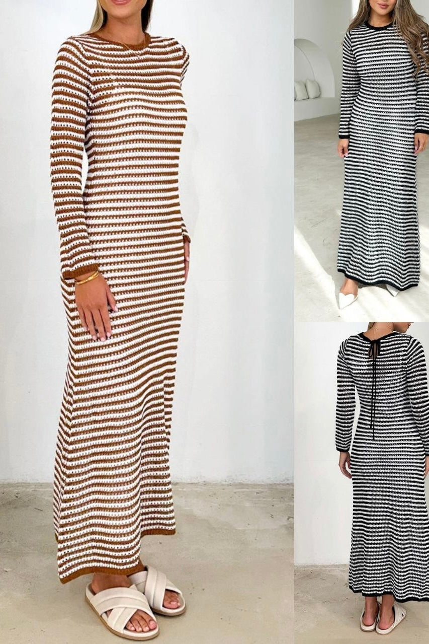 Woman wearing black and white striped knit maxi dress with long sleeves and round neckline -  boho cotton knit dress Australia.