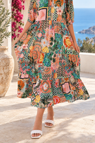 Amira Island Dream tropical patchwork rayon midi dress with V-neck, billowed sleeves and tiered skirt