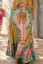 Amara floral boho maxi skirt in 100% rayon with colourful placement print, gathered frill hem and tassel tie