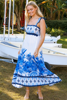 Blue and white floral boho maxi dress with statement border print at Bohemian Love Runway 