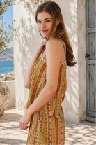 Amara rayon slip top by Dreamcatcher with multicoloured boho stripe print, adjustable straps and white cotton lace trim.