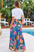 Wild Tropic blue boho maxi skirt with tropical floral print, side splits, tassel tie and flowing tiered hem