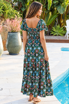 Emily bohemian maxi dress in green rayon with flutter sleeves tiered skirt and shirred back