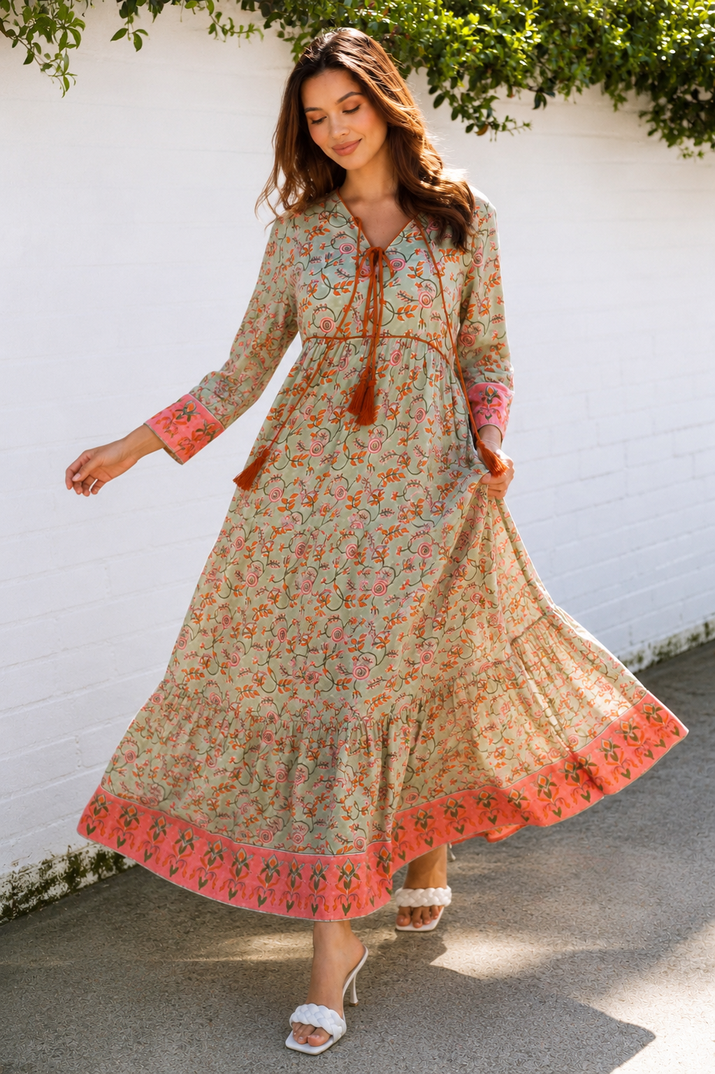 Lauren 100% cotton floral boho maxi dress in sage green with coral botanical print, tassel ties and contrast border hem