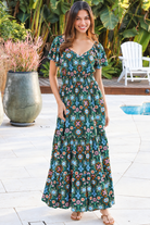 Emily bohemian maxi dress in green rayon with flutter sleeves tiered skirt and shirred back