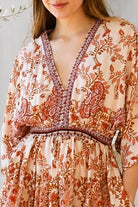 Shop Cinnamon V-Neck Kimono Sleeve Maxi Dress in rayon with a warm boho print at Bohemian Love Runway Australia