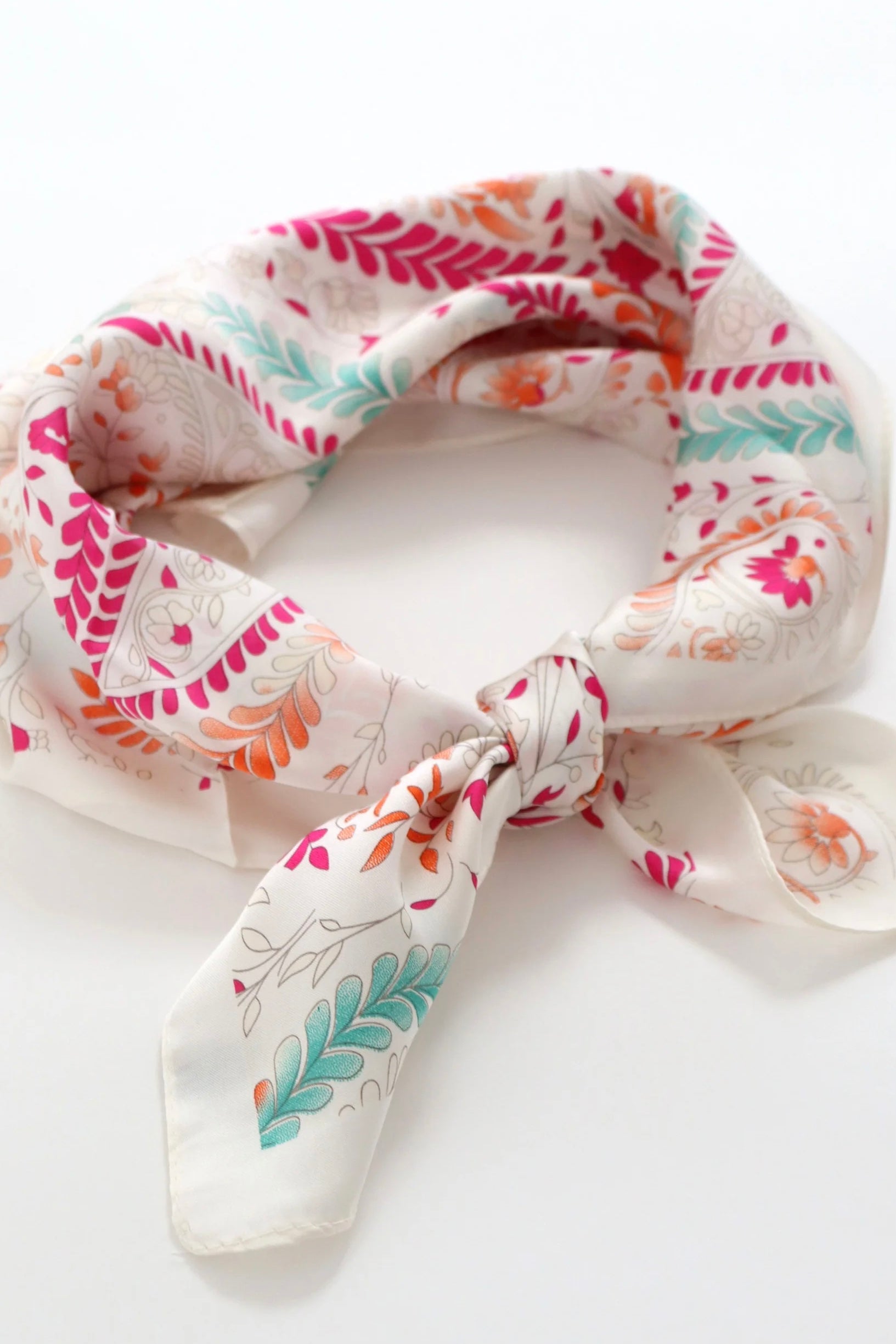 Camille Floral Paisley Bandana Scarf worn as a floral head scarf and bandeau top in blush pink paisley print