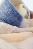 Penelope oversized fluffy winter scarf in pink, cream and blue with long fringed ends