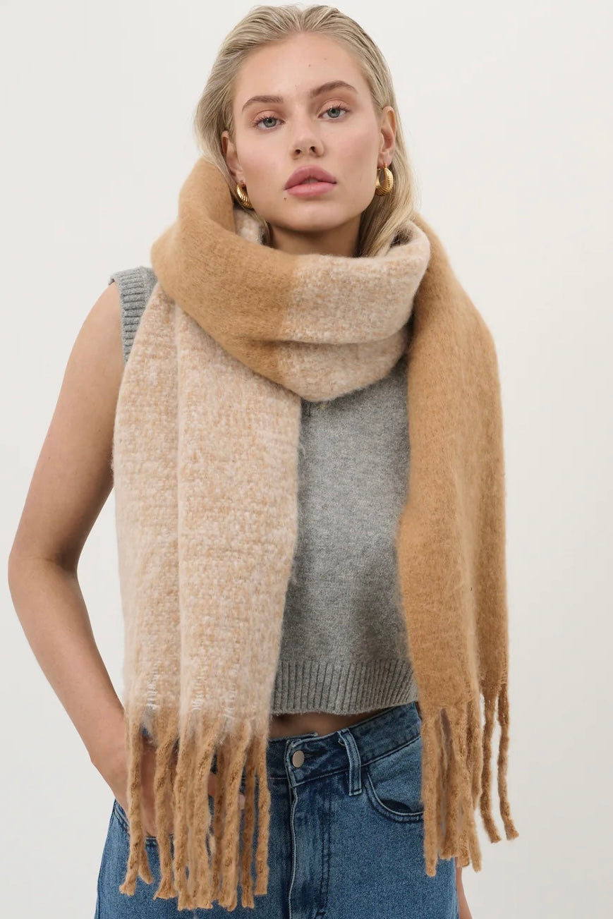 Woman wearing a caramel and beige fluffy boho scarf with fringe - Amber Light soft winter wrap by Bohemian Love Runway.