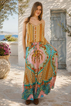 Amara floral boho maxi skirt in 100% rayon with colourful placement print, gathered frill hem and tassel tie
