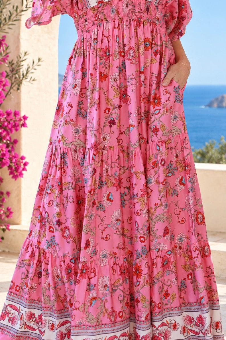 Eliana Bloom pink floral rayon boho maxi dress with V-neckline, smocked waist and tiered skirt.