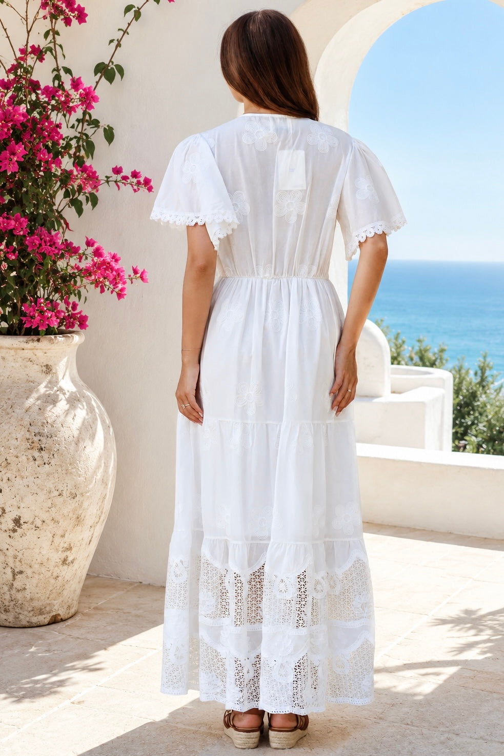 Willow white embroidered cotton maxi dress with openwork lace and tassel ties by Salty Palm at Bohemian Love Runway