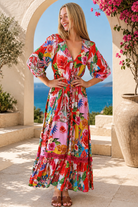Scarlet floral long sleeve boho maxi dress with V-neck, buttons, elastic waist and lace detail at Bohemian Love Runway