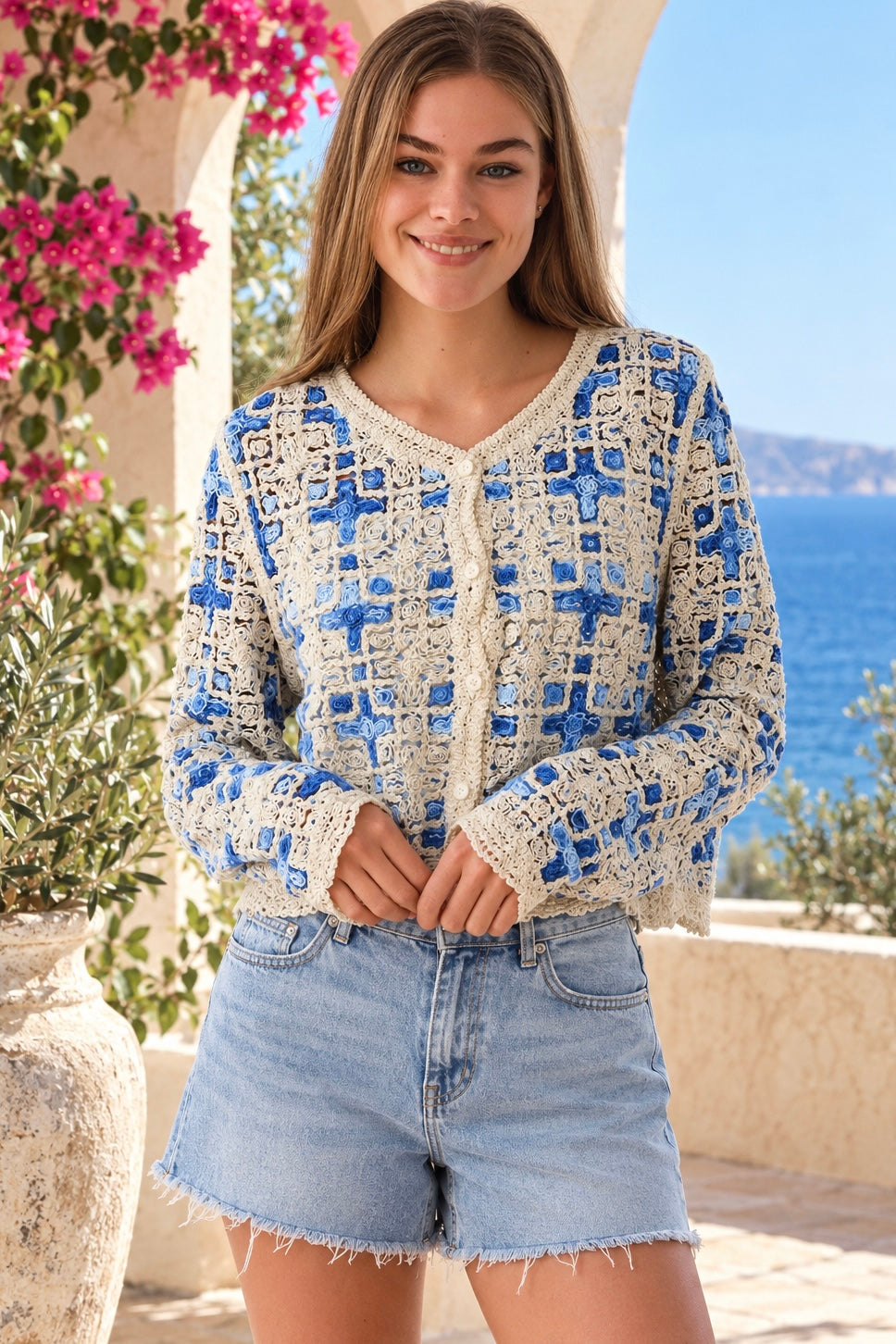 Blue and ivory cotton crochet boho cardigan with intricate open weave, V-neck, buttons and scalloped edging