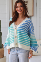 Blue gradient striped knit cardigan V neck button front ribbed cuffs drop shoulder Charlotte the Label ocean tones. Boho Knitwear Australia.