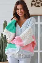 Pastel colour block chunky ribbed knit cardigan in pale blue mint blush and cream women’s boho winter style