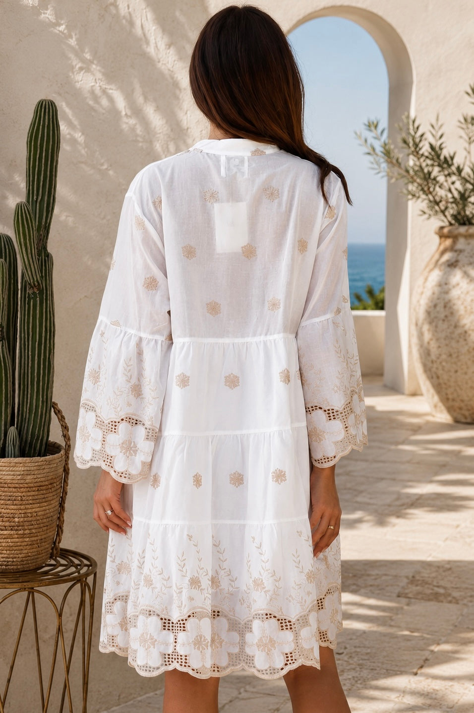 Honeyed Garden white cotton embroidered mini dress with floral cutwork hem and sleeves at Bohemian Love Runway