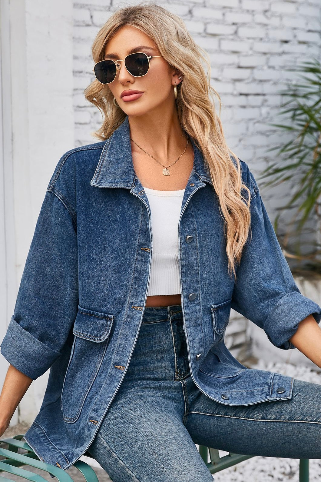 Oversized two-tone blue denim jacket with patch pockets worn over denim jeans - Bohemian Style Australia.