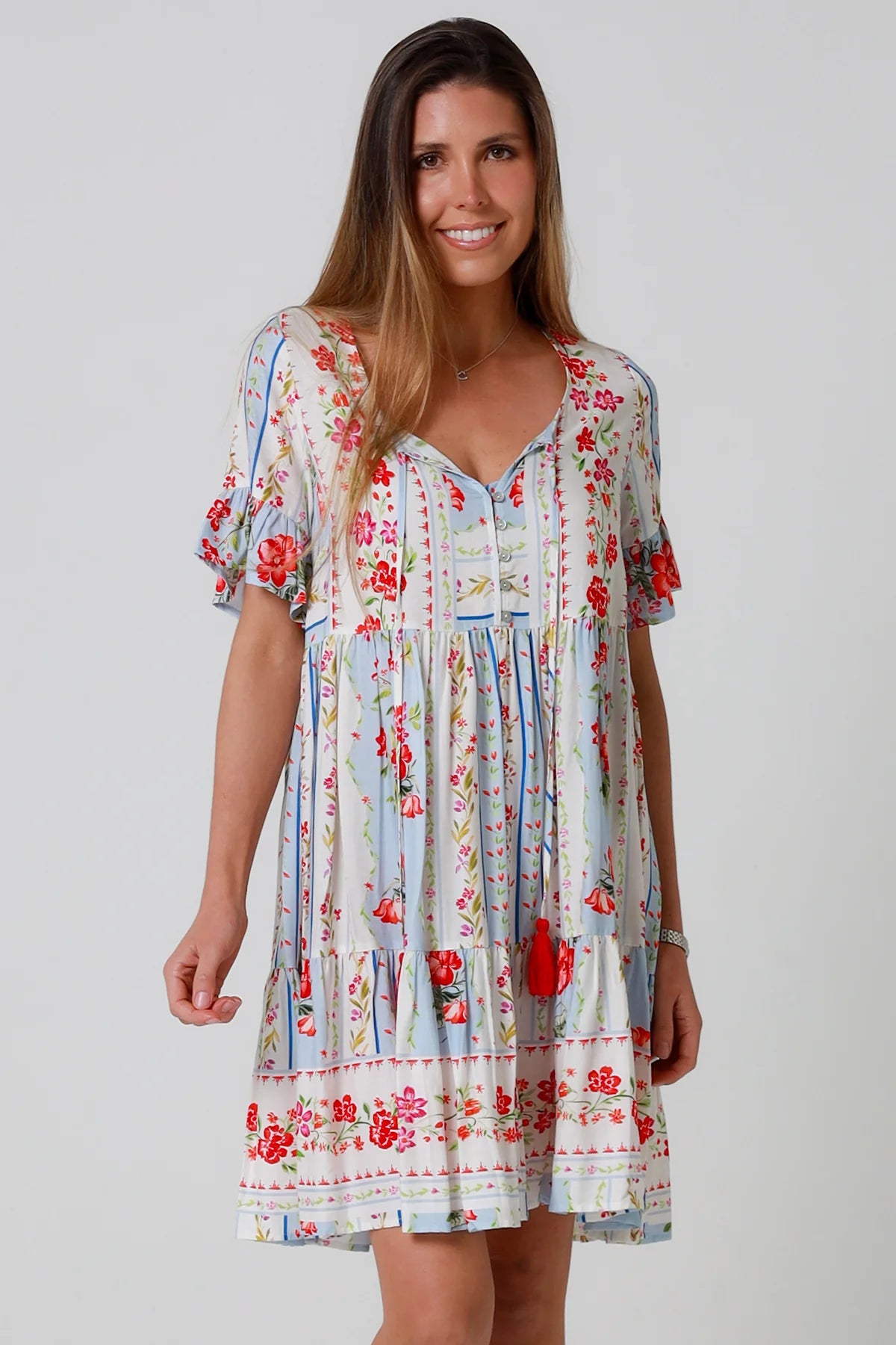 Boho mini dress with tassels v-neckline frill sleeves and border print in florals - Cherry Blossom Mini Dress Australia